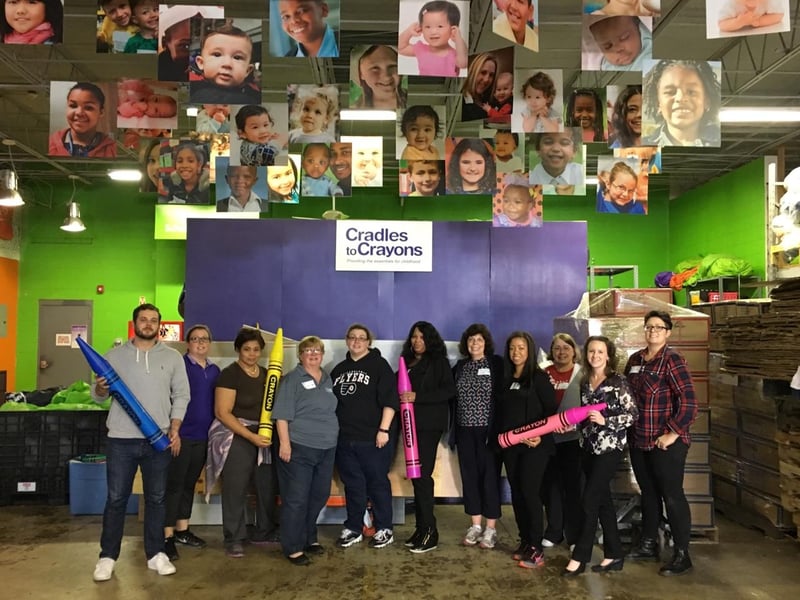 ECBM Volunteers With Cradles To Crayons For IICF Week of Giving